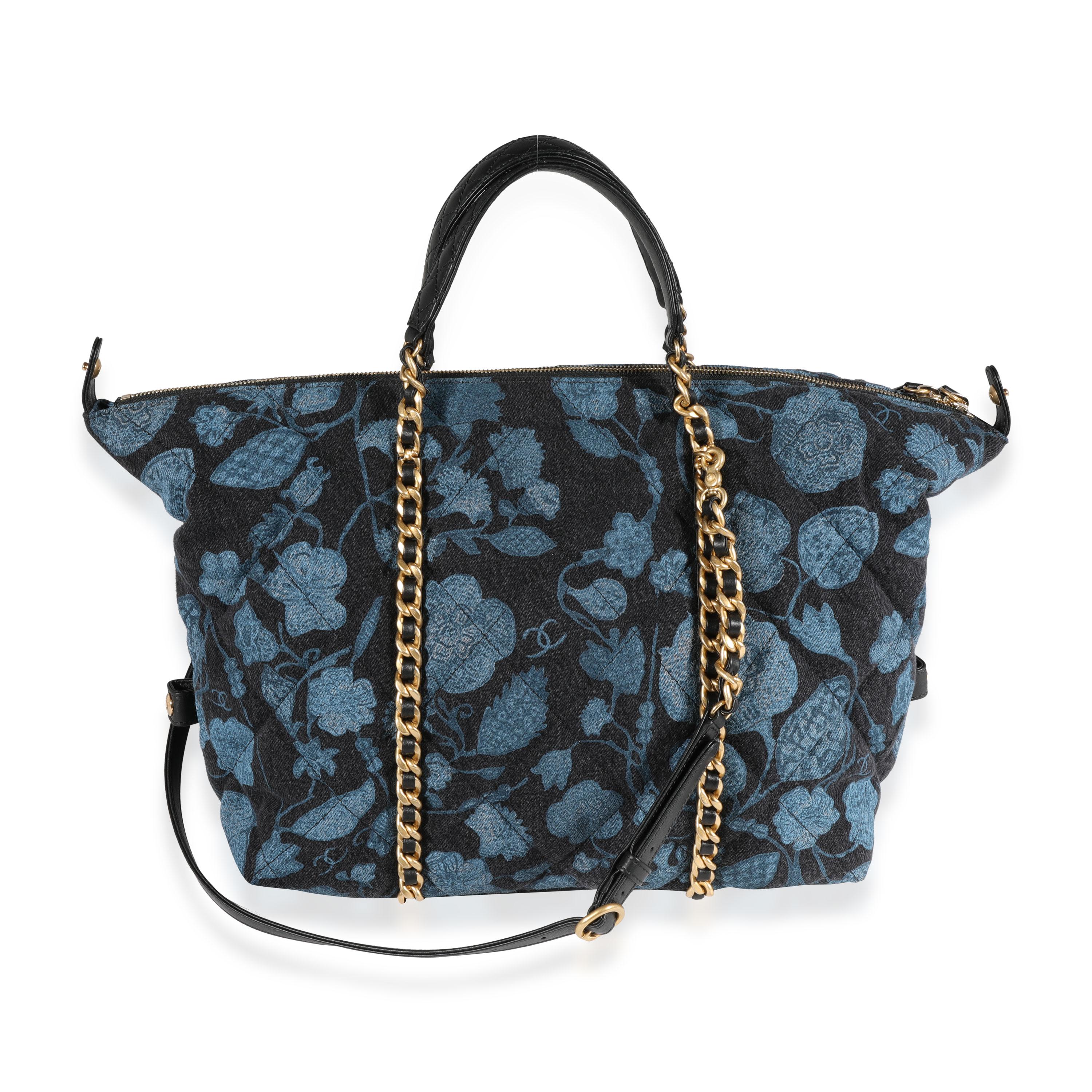 Listing Title: Chanel Blue Floral Quilted Denim Bowling Bag
SKU: 121833
MSRP: 4800.00
Condition: Pre-owned 
Handbag Condition: Excellent
Condition Comments: Excellent Condition. Some plastic at hardware. Minor scratching at hardware. No other