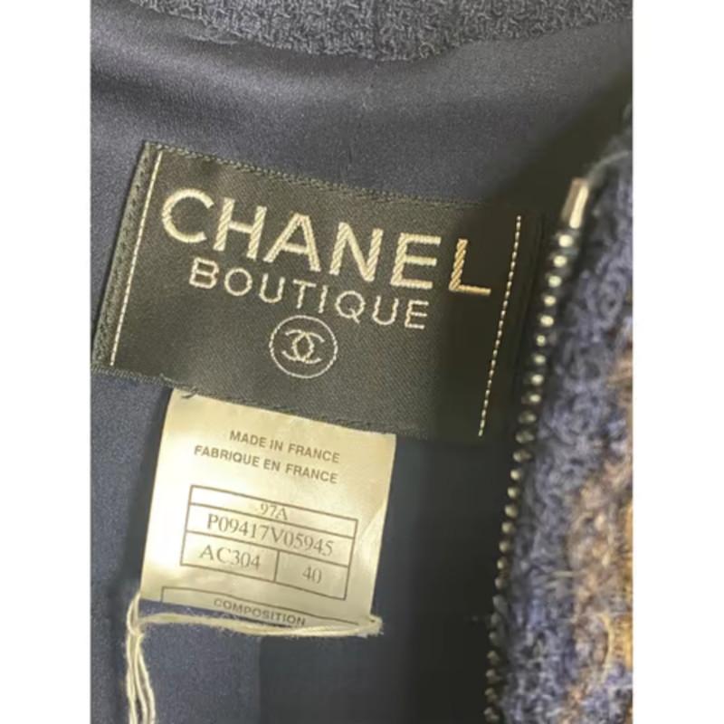 Chanel blue gold wool Jacket
 Size  40 
 Wool / Polyamide 
 Bust 44cm 
 Length 78cm 
 Sleeve 55cm 
 Waist 39cm
