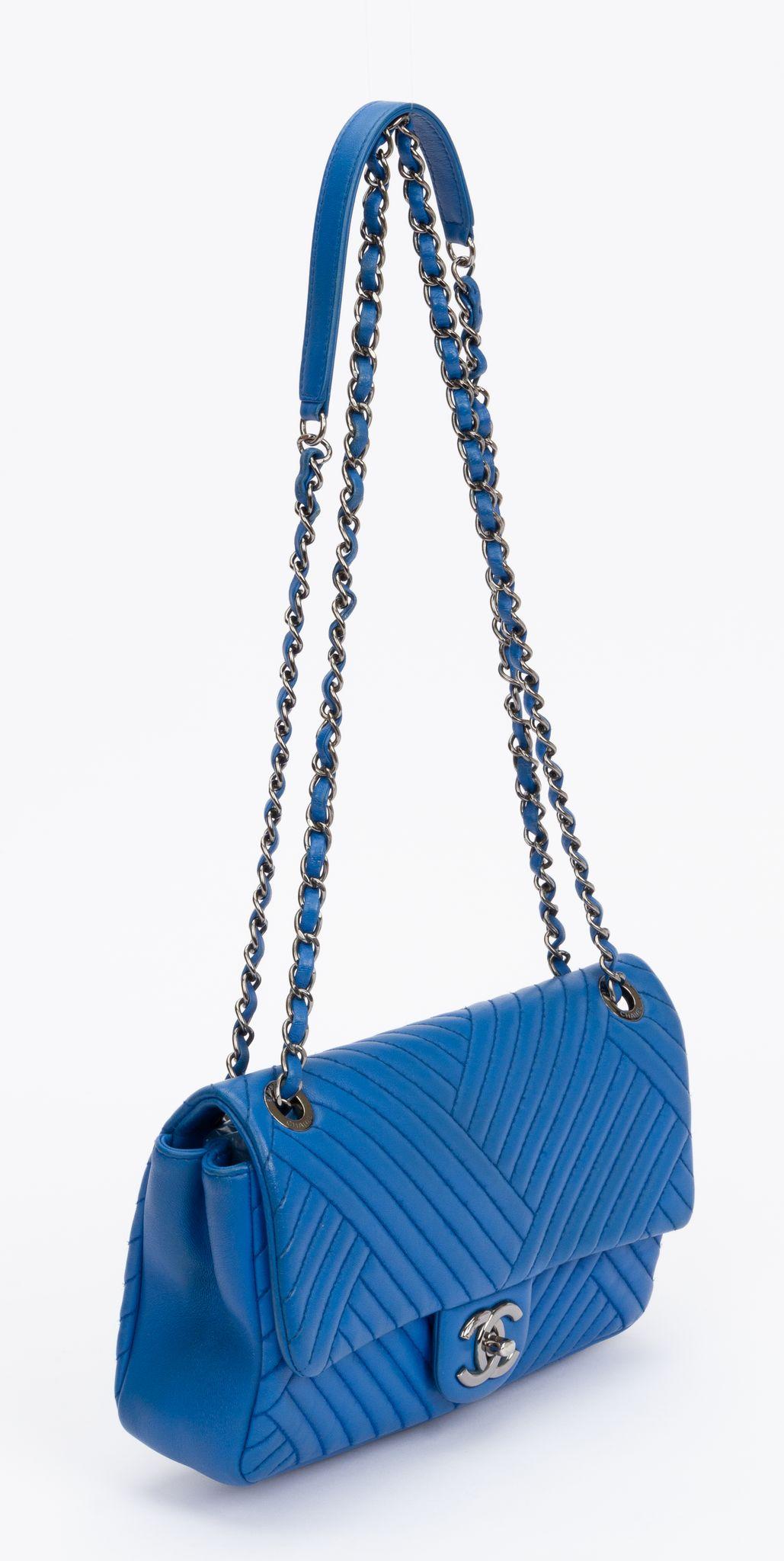 Chanel blue Izmir quilted leather single flap with silver tone hardware. Shoulder strap drop 13.5