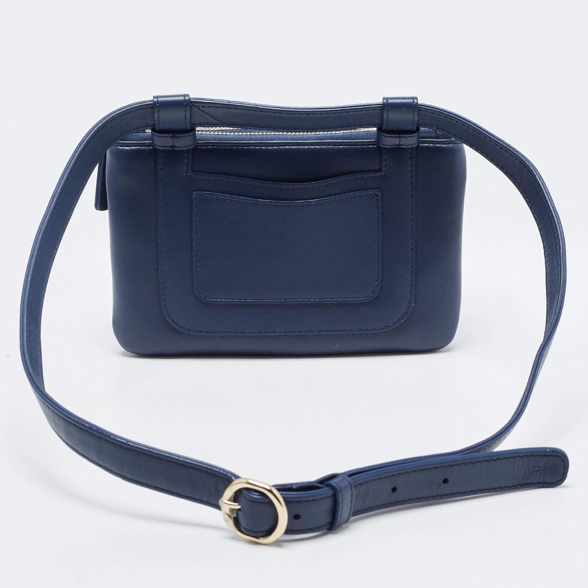 The Chanel Mania waist bag is a stylish accessory that combines practicality with luxury. Crafted from high-quality leather, it features the iconic CC logo in an eye-catching design. With its adjustable waist strap and compact size, this bag is