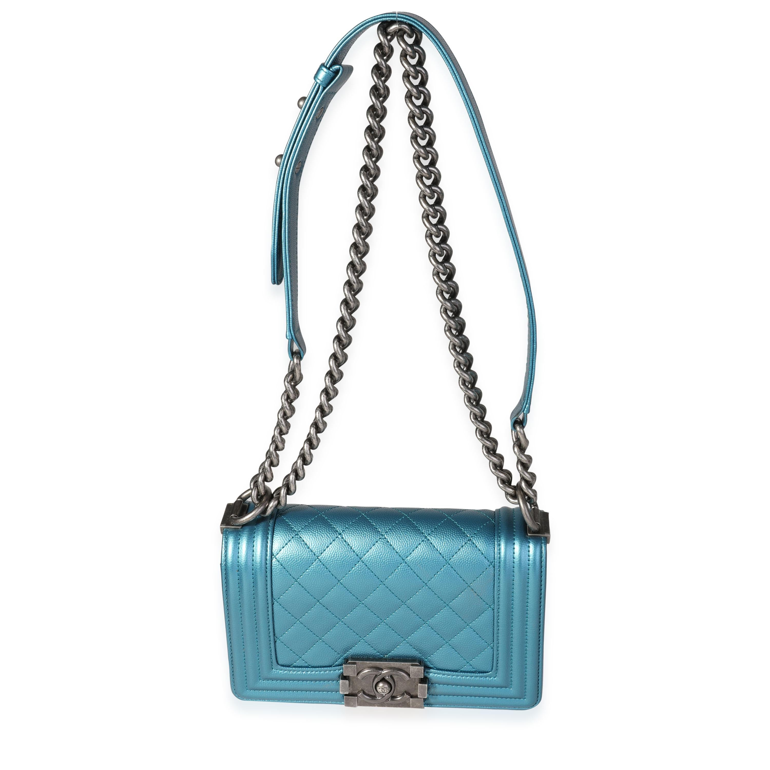 Listing Title: Chanel Blue Metallic Quilted Caviar Small Boy Bag
SKU: 118353
Condition: Pre-owned (3000)
Handbag Condition: Very Good
Condition Comments: Interior stains
Brand: Chanel
Model: Boy bag
Origin Country: France
Handbag Silhouette: