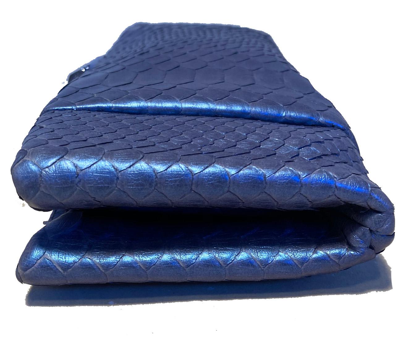 blue snakeskin clutch