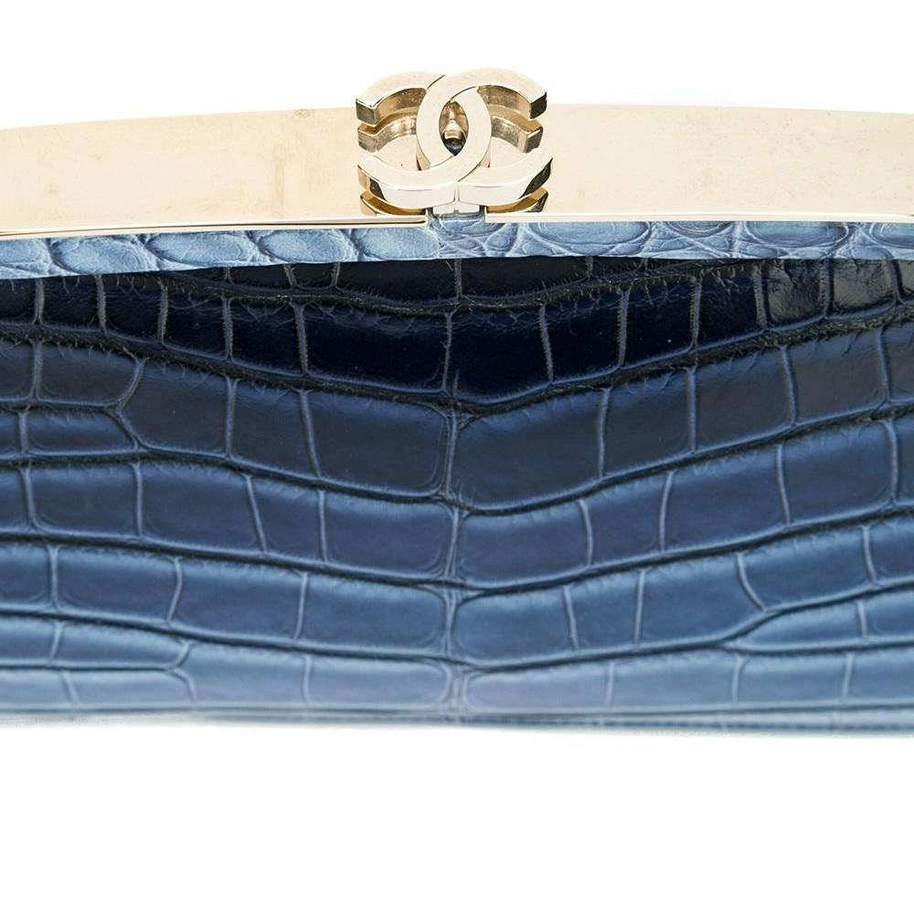 This rare and stunning maroquinierie derives from Chanel's marine-inspired Cruise 2014 collection. Crafted with a precious skin exterior, the hard-cased body features a unique and subtle ombre patterning that gently fades between different shades of