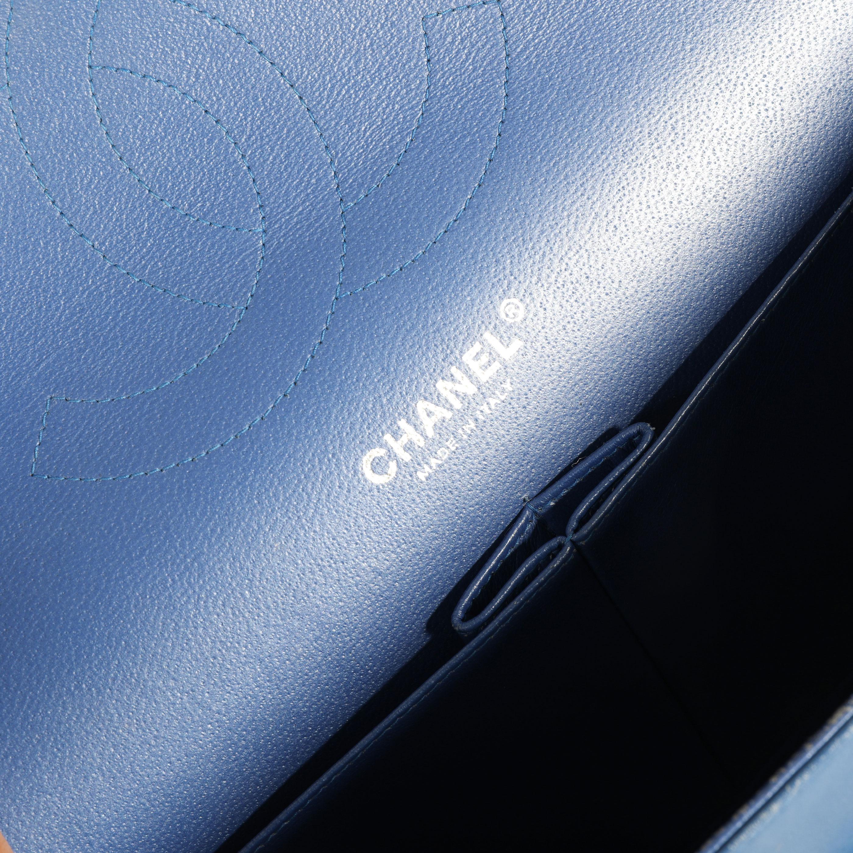  Chanel Blue Patent Leather Quilted Jumbo Classic Double Flap Bag
SKU: 111808
MSRP: USD 8,500.00
Condition: Pre-owned (3000)
Condition Description: 
Handbag Condition: Very Good
Condition Comments: Very Good Condition. Small spots to patent leather.