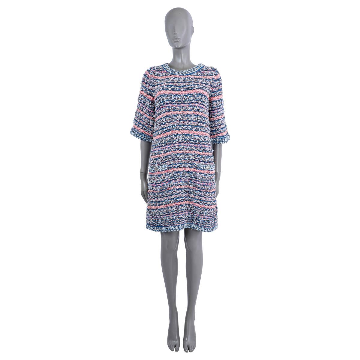 100% authentic Chanel striped knit dress in blue, pink and white polyamide (41%), viscose (23%), polyester, (16%), cotton (14%) and silk (6%). Features short sleeves and two buttoned pockets on the front with jeweled Gripox buttons. Unlined. Has