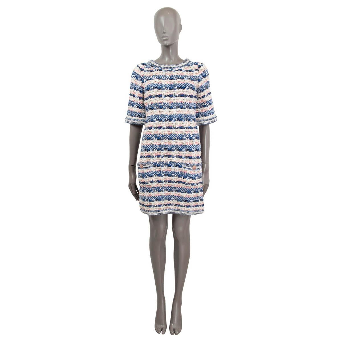 100% authentic Chanel short sleeve lurex knit dress in blue, pink and ivory viscose (42%), cotton (27%), polyester (21%), wool (5%) and polyamide (5%) with two Gripoix buttoned pockets on the front. Unlined. Has been worn and is in excellent