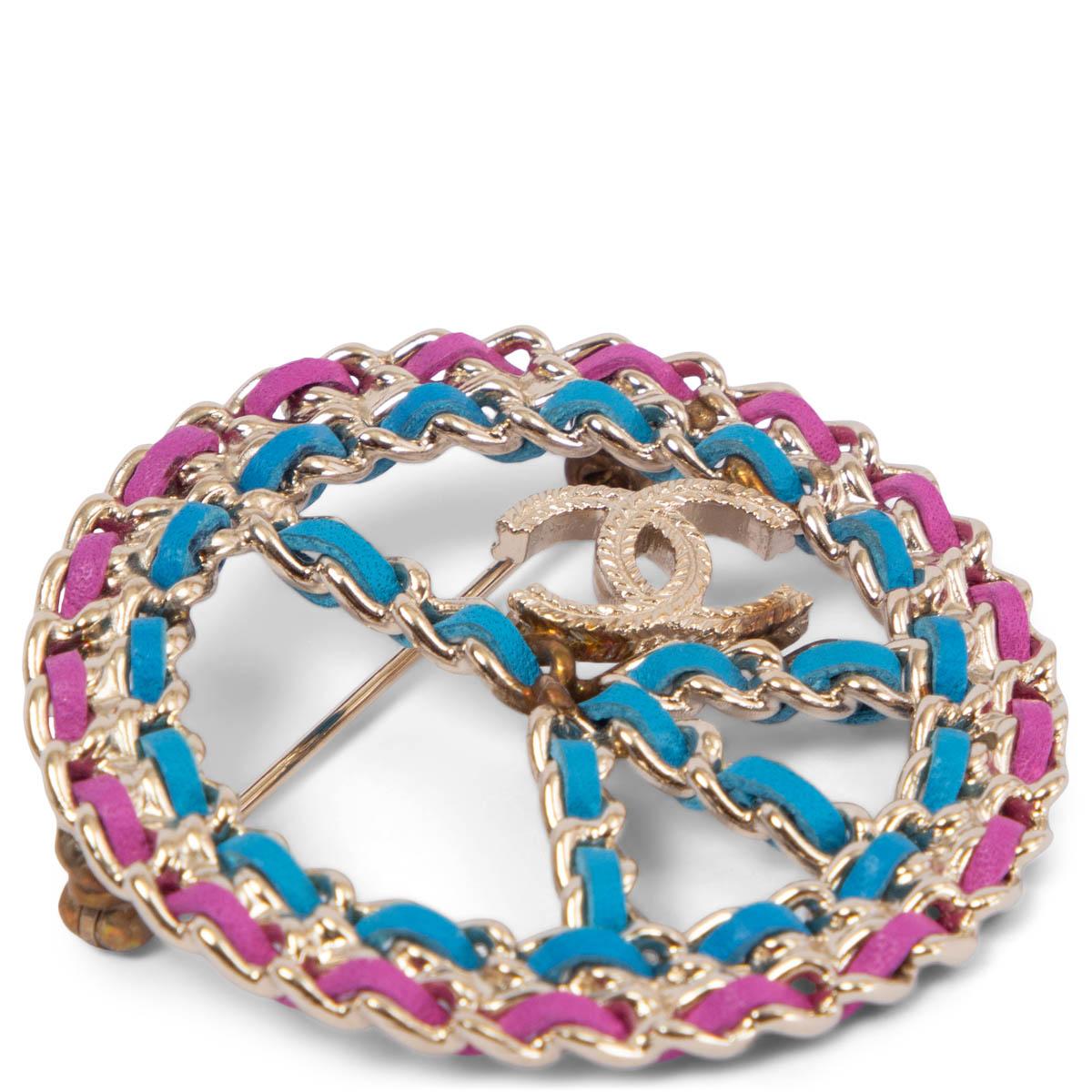 100% authentic Chanel 2018 Pre-Spring/Summer peace sign brooch in blue and magenta leather and light gold-tone hardware. Has been carried and shows some soft discoloration on some parts of the metal. Overall in very good condition.