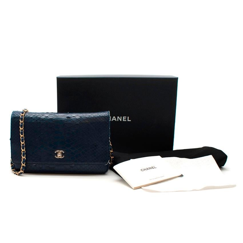 Chanel Blue Python CC Wallet on Chain

-Elegant timeless style
-Made of the finest skins
-Legendary Chanel CC logo fastening to the front 
-Signature chain and leather shoulder strap
-Interior zipped pocket 
-6 card slots
-Age: 2017 
-Original box