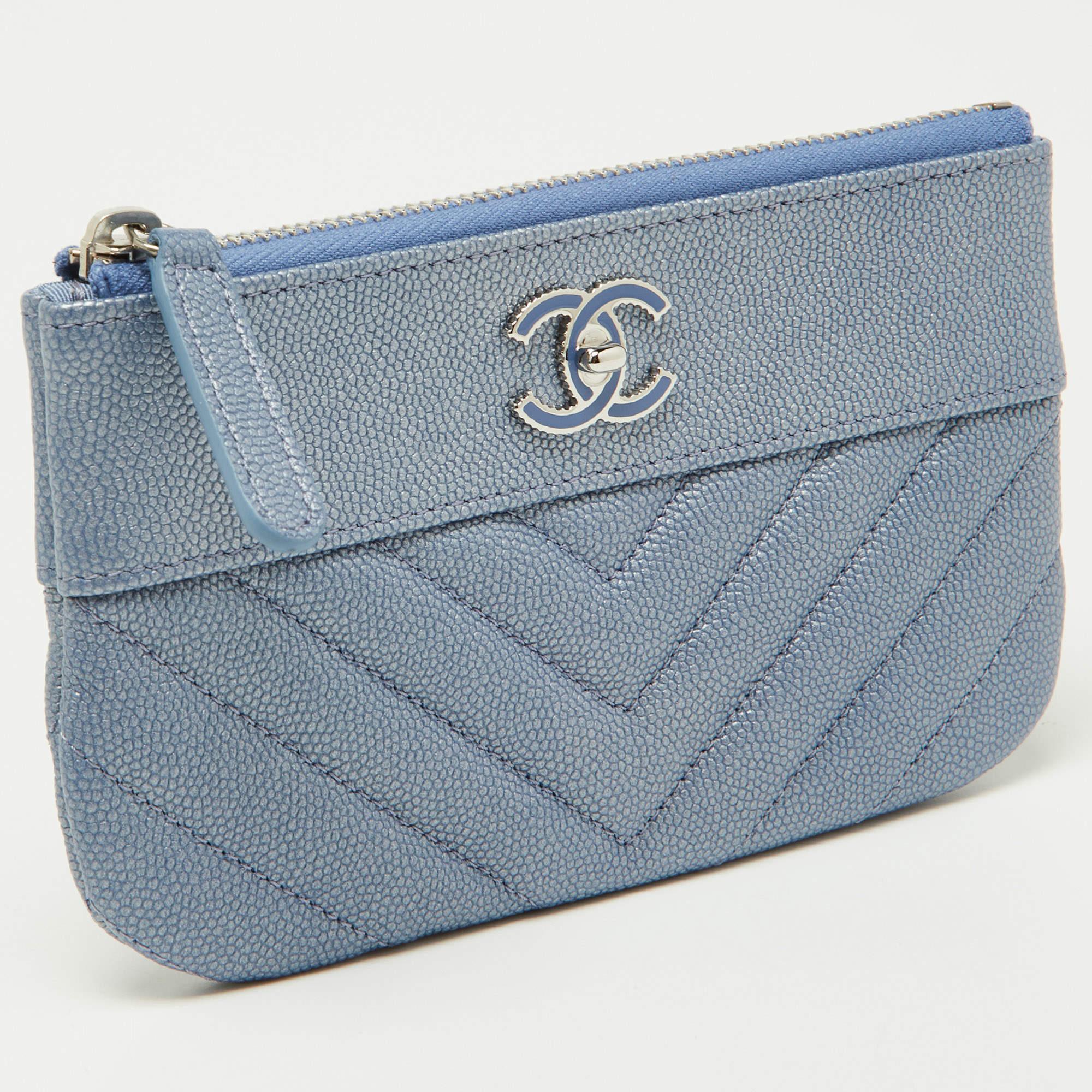 Store your essentials effortlessly in this sturdy Chanel CC pouch. It features an elegant design and a roomy interior. Featuring a rich shade, this pouch is a stylish accessory.

Includes
Original Dustbag, Info Booklet, Authenticity Card
