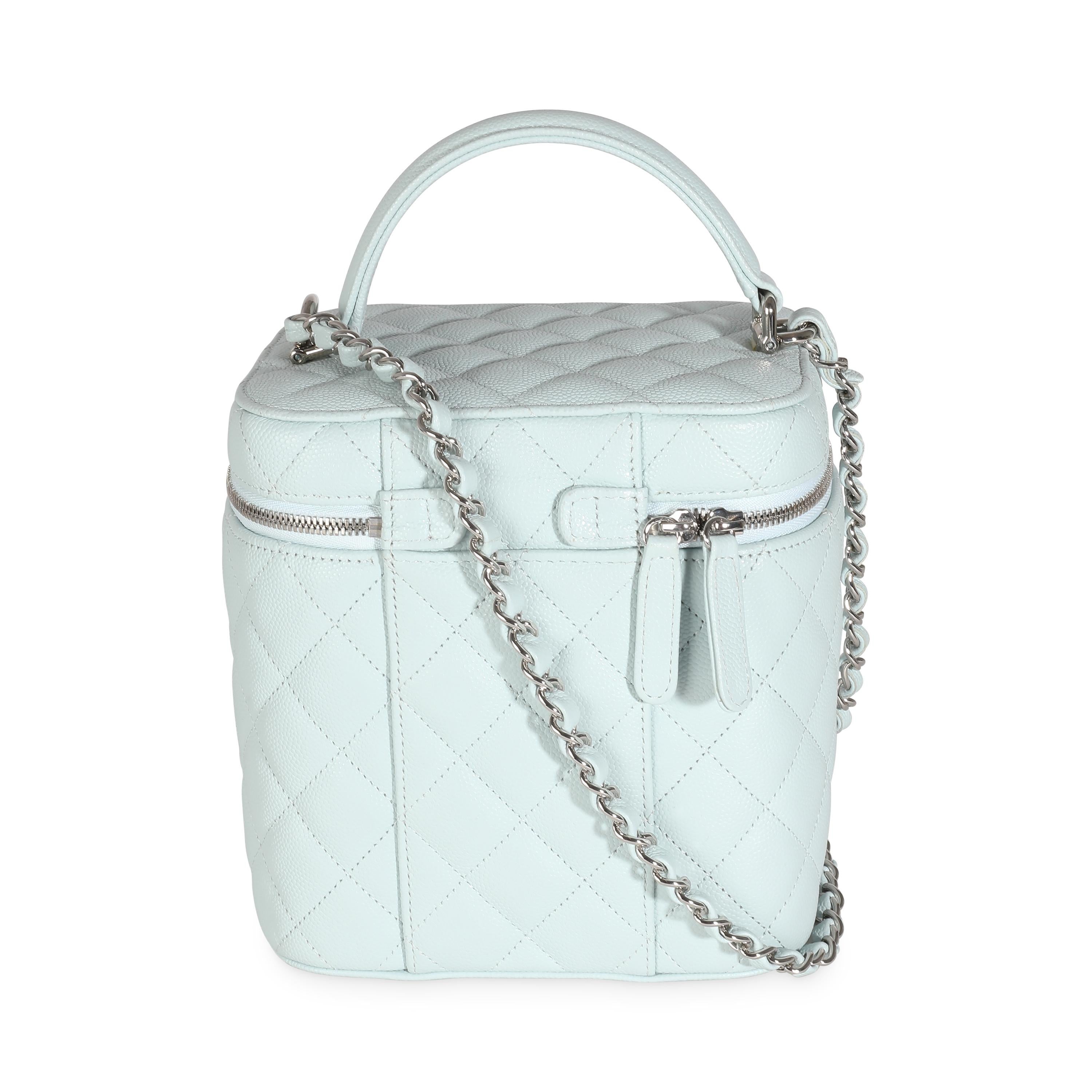 Listing Title: Chanel Blue Quilted Caviar Top Handle Vanity Case
SKU: 141438
Condition: Pre-owned 
Condition Description: Intrinsically Chanel, the medium Coco top handle bag was named after the maison's founder. Introduced in 2015, the bag