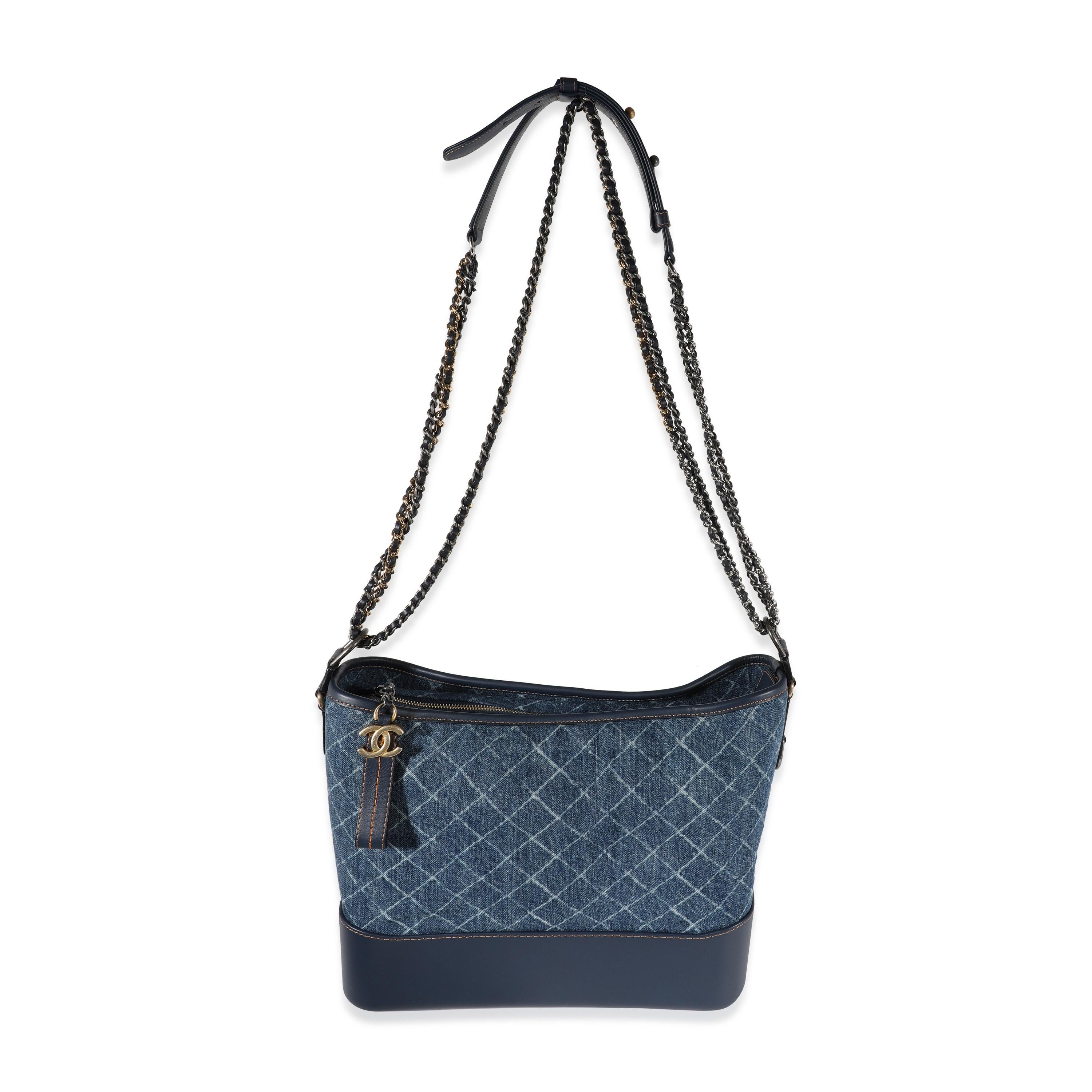 Listing Title: Chanel Blue Quilted Denim & Calfskin Large Gabrielle Hobo
SKU: 121991
MSRP: 4200.00
Condition: Pre-owned 
Handbag Condition: Excellent
Condition Comments: Excellent Condition. Light scuffing to leather base. No other visible signs of