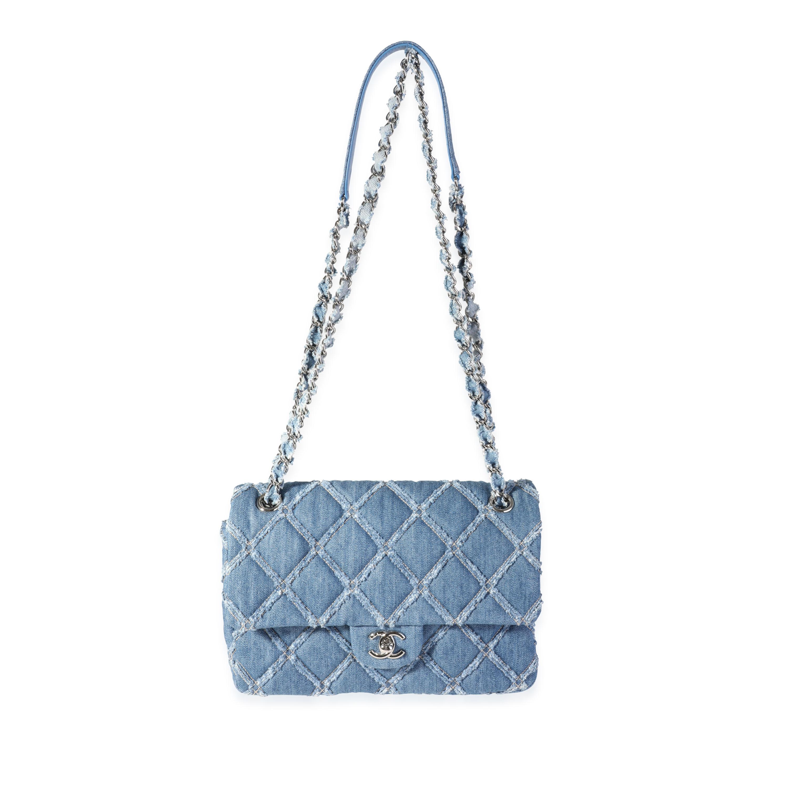Listing Title: Chanel Blue Quilted Denim Medium Single Flap Bag
SKU: 119435
Condition: Pre-owned (3000)
Handbag Condition: Never Worn
Brand: Chanel
Model: Blue Quilted Denim Medium Flap Bag
Origin Country: France
Handbag Silhouette: Shoulder
