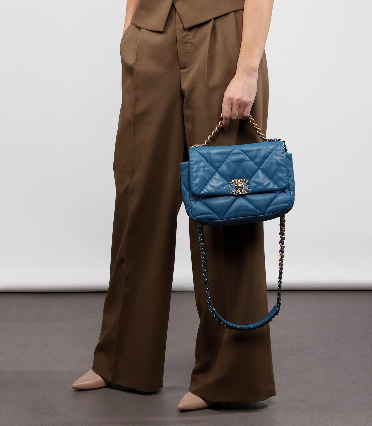 Chanel Blue Quilted Goatskin Leather Small 19 Flap Bag

Product Details
Xupes Ref: HB5672
Brand: Chanel
Model: Small 19 Flap Bag
Type: Top Handle, Shoulder, Crossbody
Serial Number: 29880896
Age: 2019
RRP: £5,590
Accompanied By: Chanel Dust Bag,