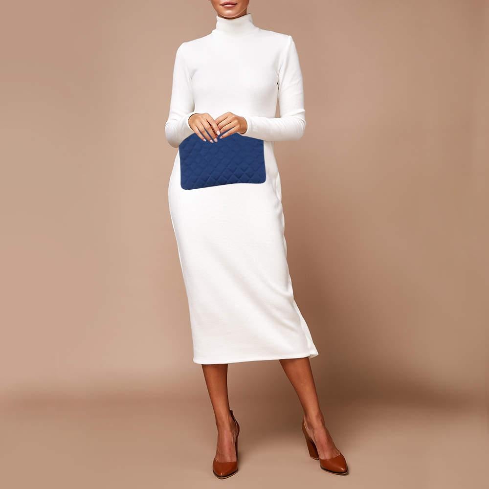 Functional and fashionable, this clutch is a classy styling choice. It is crafted from quality materials, and its lined interior will keep your evening essentials in a neat way.

