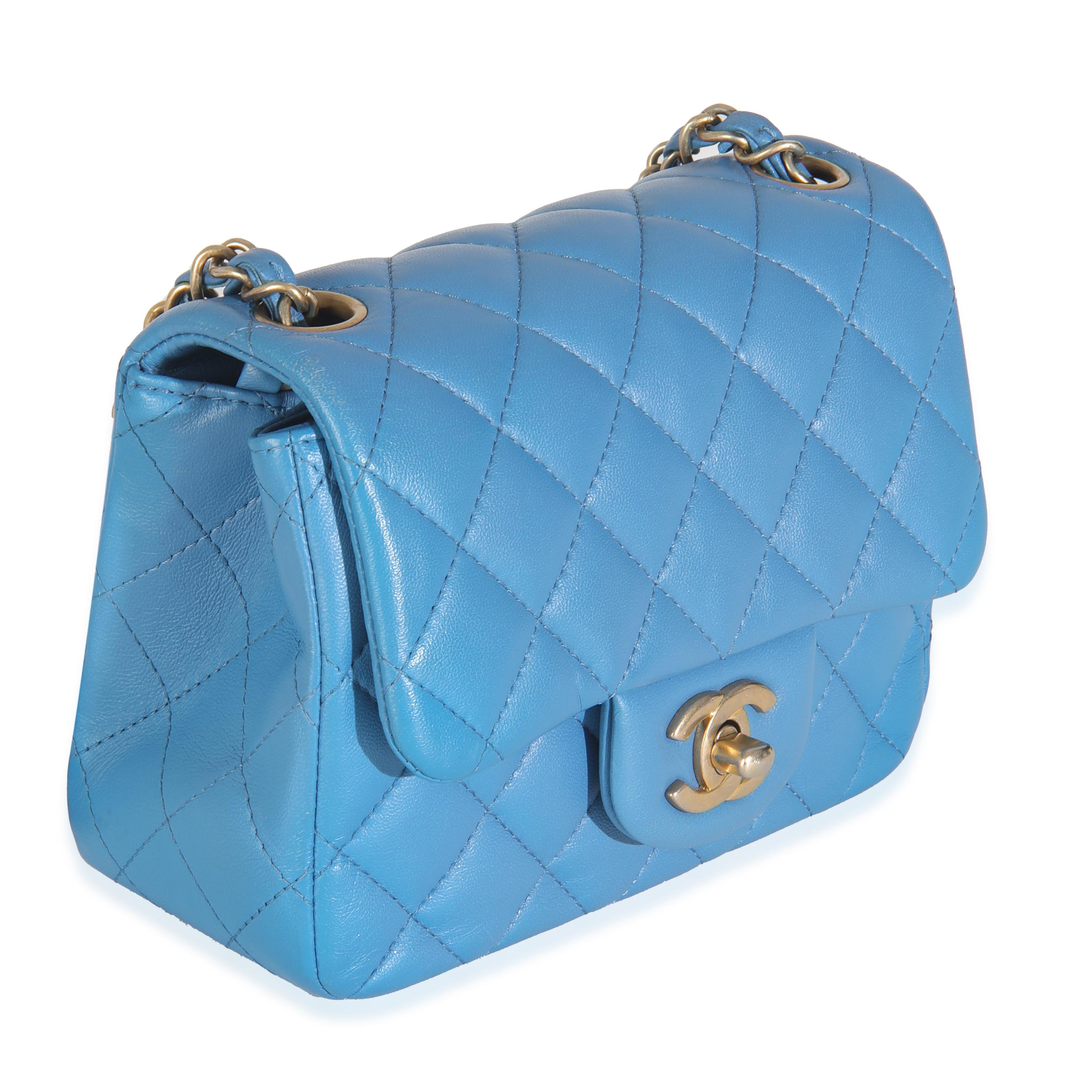 Listing Title: Chanel Blue Quilted Lambskin Mini Square Flap Bag
SKU: 145883
Condition: Pre-owned 
Condition Description: A timeless classic that never goes out of style, the flap bag from Chanel dates back to 1955 and has seen a number of updates.