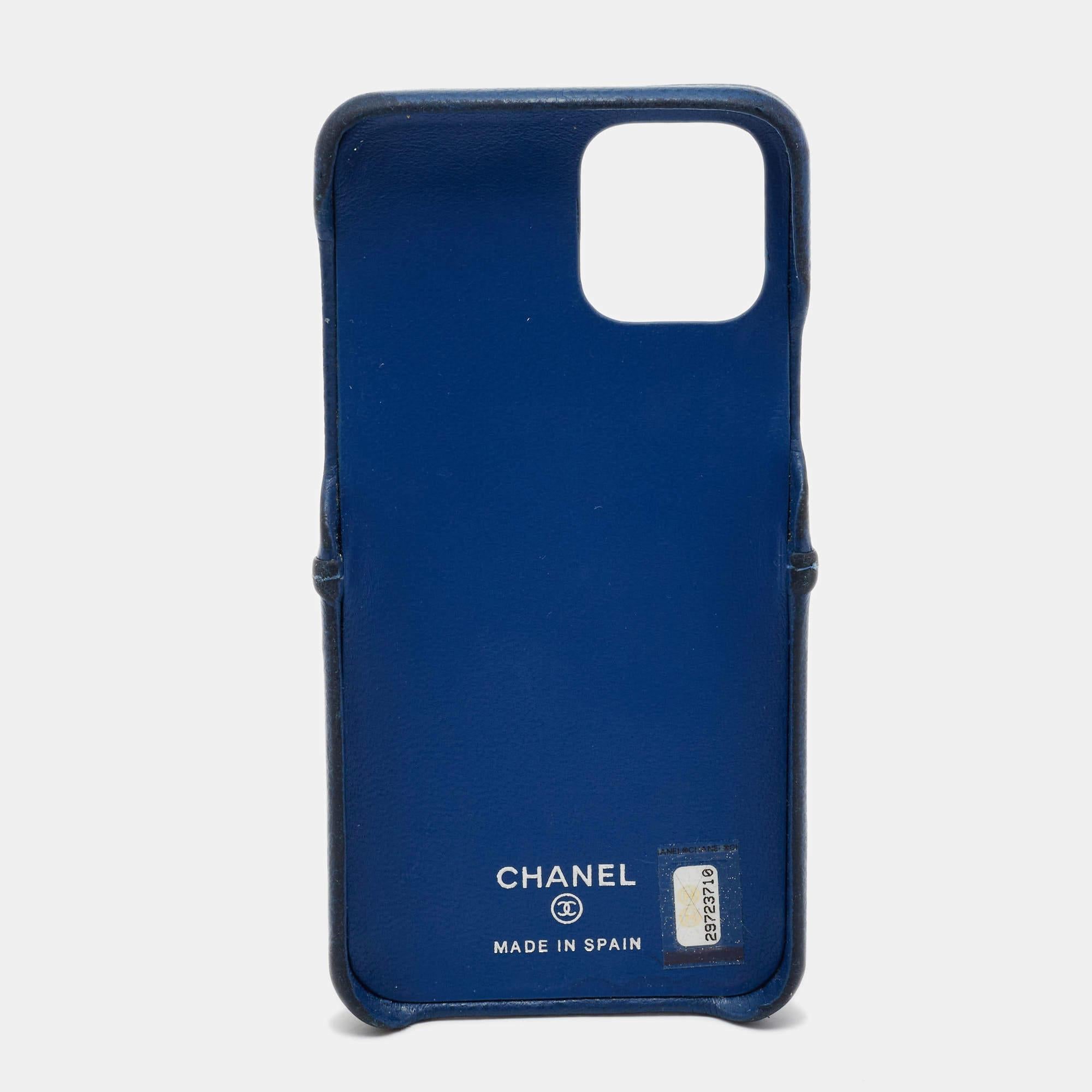 This case from Chanel is for iPhone 11 Pro users. It is made from leather and features the signature diamond quilting, a slip pocket, and the CC logo. The case has been designed to protect your phone while complementing your style at the same