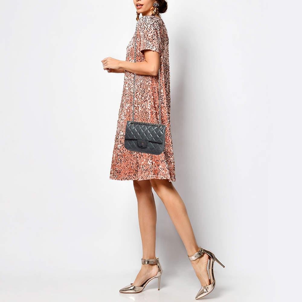 The fashion house's tradition of excellence coupled with modern design sensibilities works to make this Chanel Classic 224 Reissue 2.55 bag one of a kind. Its a fabulous accessory to invest in.