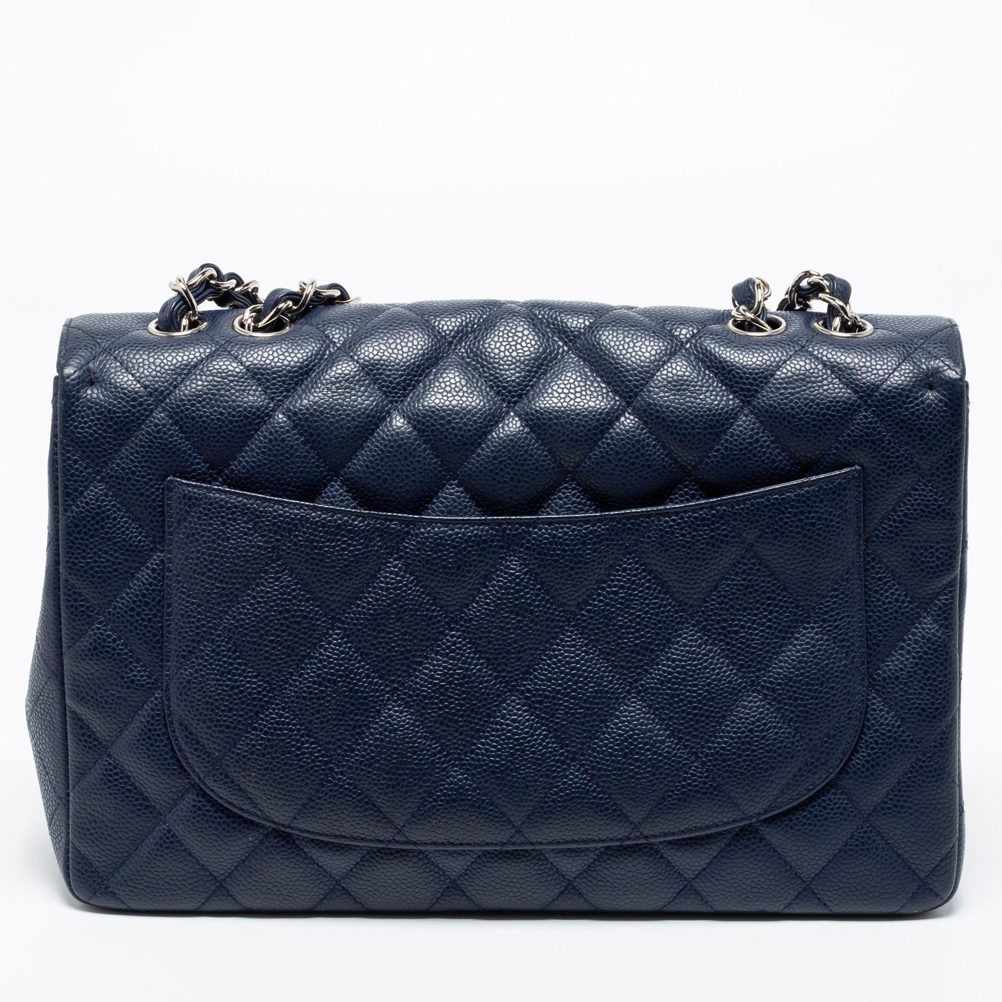 We're bringing Chanel's iconic Classic Flap bag to your closet with this creation. Beautifully crafted from leather and covered in the diamond quilt, it bears the signature label inside the leather interior and the iconic CC turn-lock on the flap.