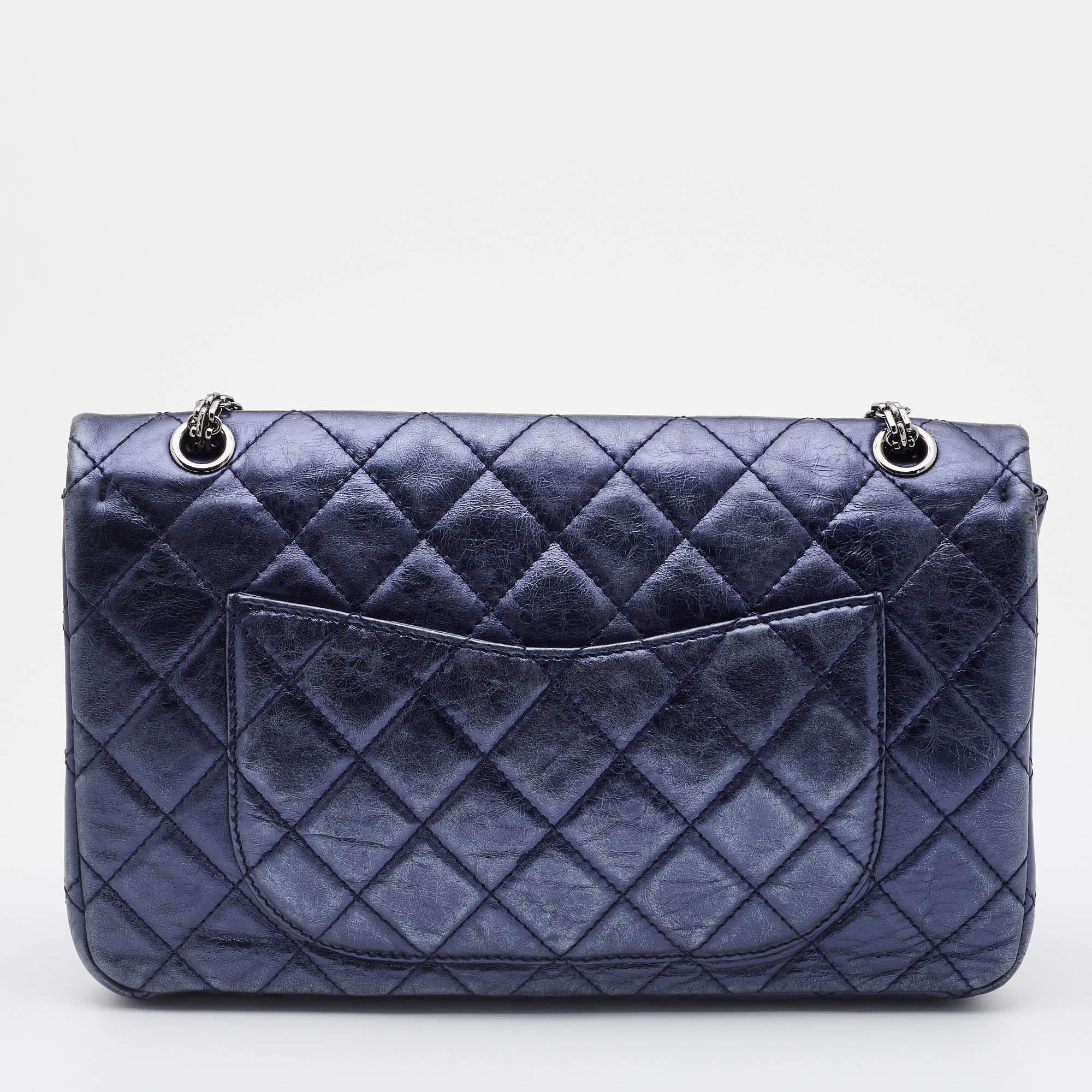 Introduce Chanel's irreplaceable style to your closet with this Reissue 2.55 Classic 227 Flap bag. Crafted using blue leather, the bag has a signature quilted exterior, the Mademoiselle lock on the front, and a leather-lined interior. Complete with