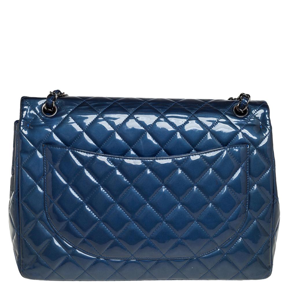 We are in utter awe of this flap bag from Chanel as it is appealing in a surreal way. Exquisitely crafted from patent leather in their quilt design, it bears their signature label on the leather interior and the iconic CC turn-lock on the flap. The