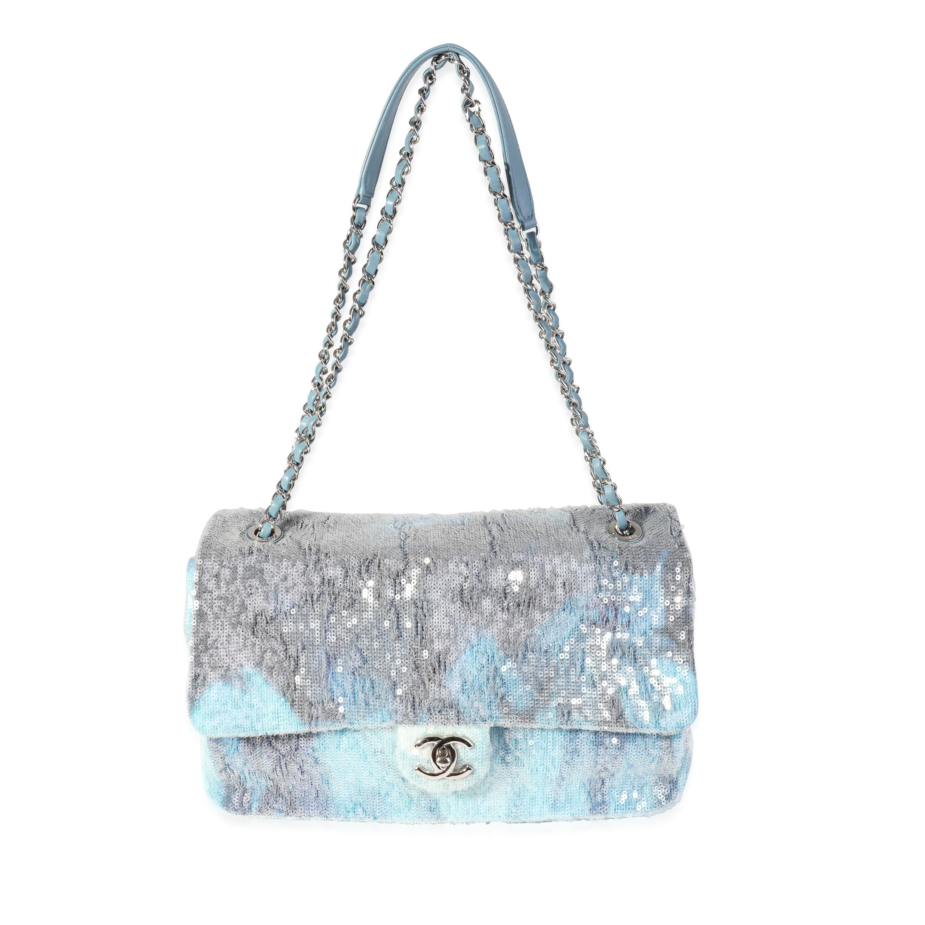 Listing Title: Chanel Blue Sequin Large Waterfall Single Flap Bag
SKU: 120458
Condition: Pre-owned (3000)
Handbag Condition: Very Good
Condition Comments: Very Good Condition. Shape loss due to wear. scratching to hardware. Marks to interior