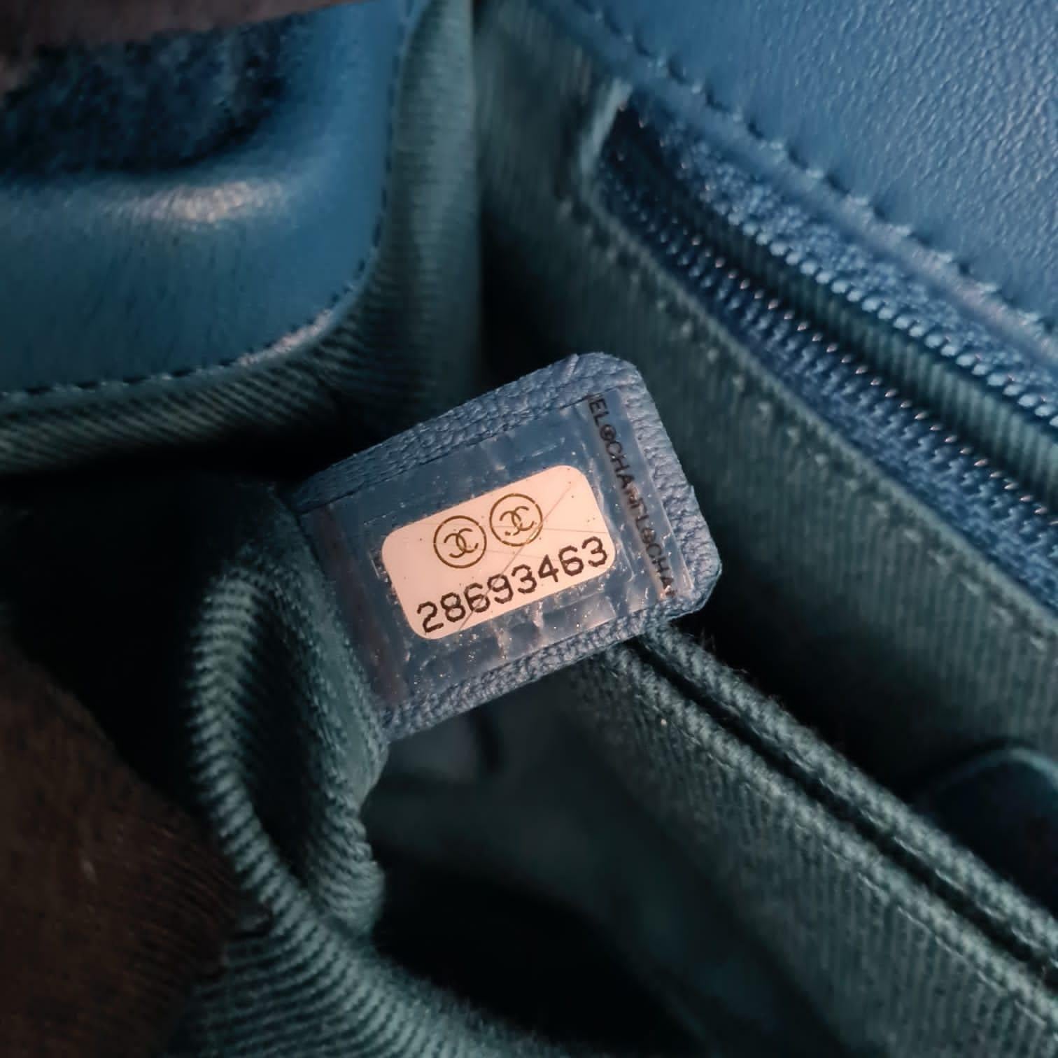 A beautiful small coco handle in blue shearling. Very minor signs of wear. Light pressed mark on the shearling under the flap. Minor rubbing. Series #28. Comes with its strap, card, dust bag and box.
