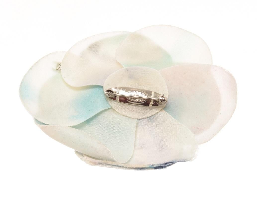 Chanel Blue Silk Tie Dye Camellia Brooch with silver-tone hardware.

59244MSC