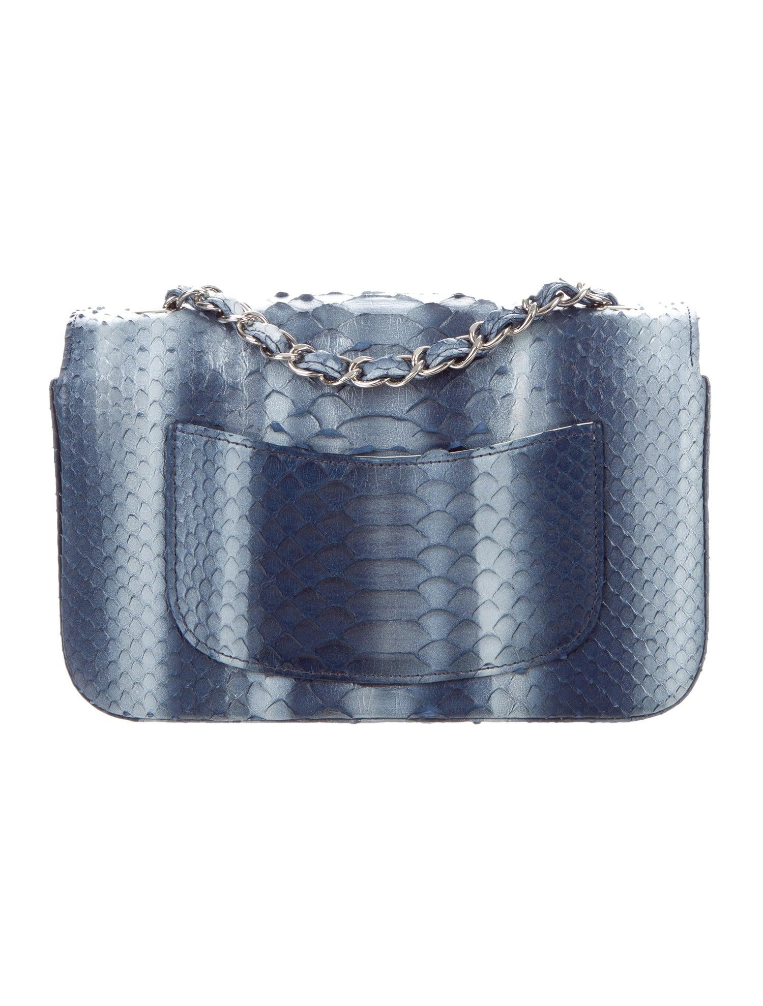 Chanel Blue Snakeskin Exotic Leather Silver Small Evening Shoulder Flap Bag in Box

Snakeskin Python
Silver-tone hardware
Leather lining
Turn-lock closure
Date code present
Made in France
Shoulder strap drop 23