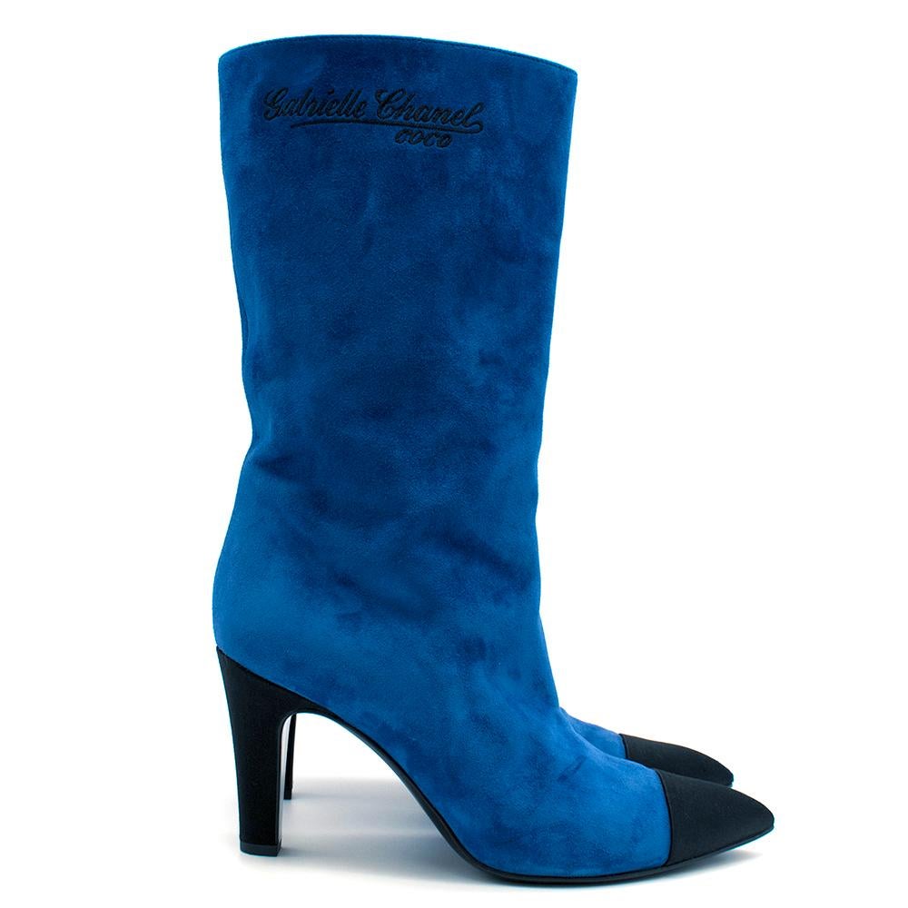 Chanel Blue Suede Gabrielle Cap-Toe Boots

-Blue Suede Body
-Black Satin Pointed Cap-toe
-Black Satin 90mm Heel
-Leather Lined
- Black contrasting CC and 'Gabrielle Chanel Coco' embroidery
- Slip-on 

Please note, these items are pre-owned and may