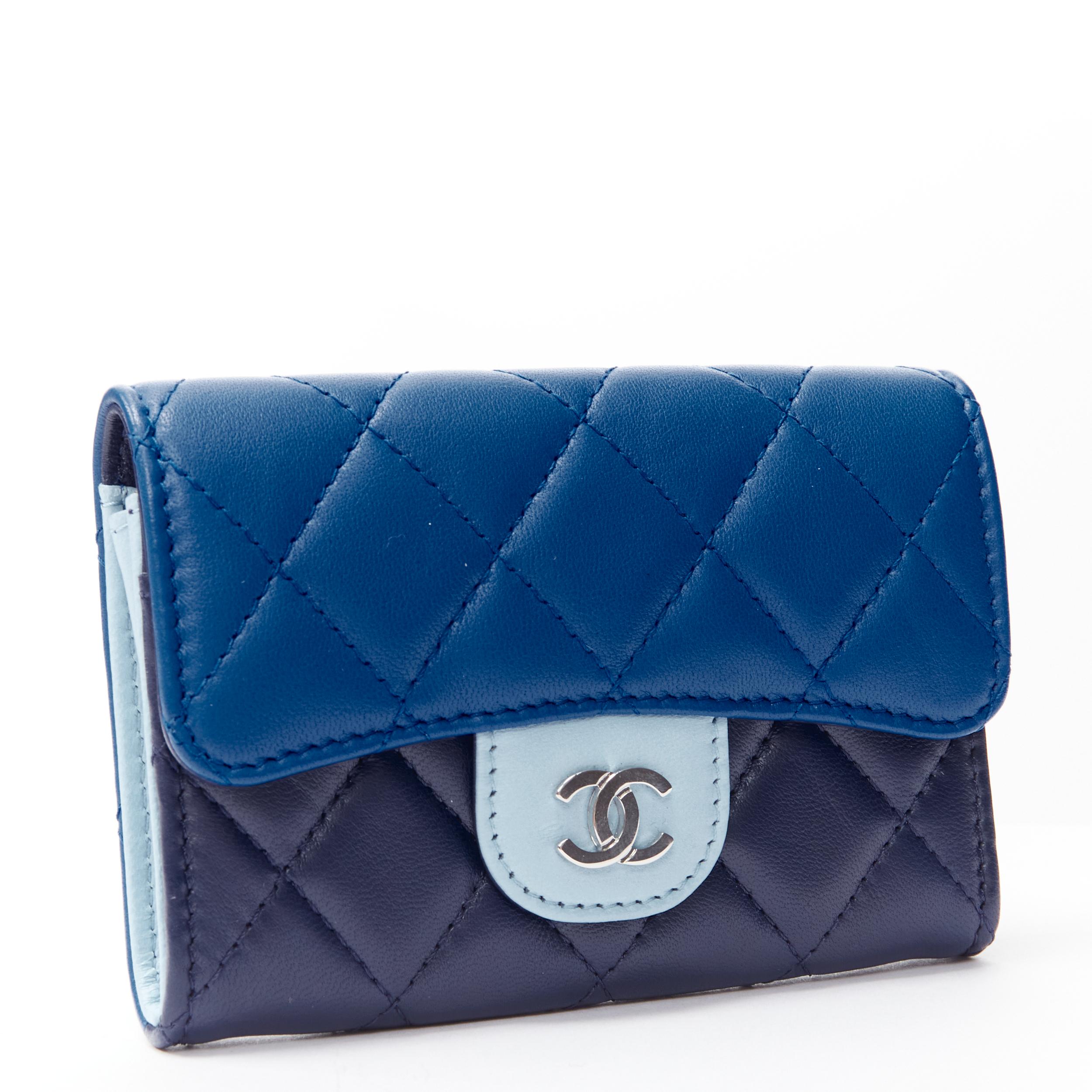 CHANEL blue tricolor lambskin diamond quilted leather CC flap PHW cardholder 
Reference: MELK/A00178 
Brand: Chanel 
Material: Leather 
Color: Blue 
Pattern: Solid 
Closure: Button 
Made in: Italy 

CONDITION: 
Condition: Excellent, this item was