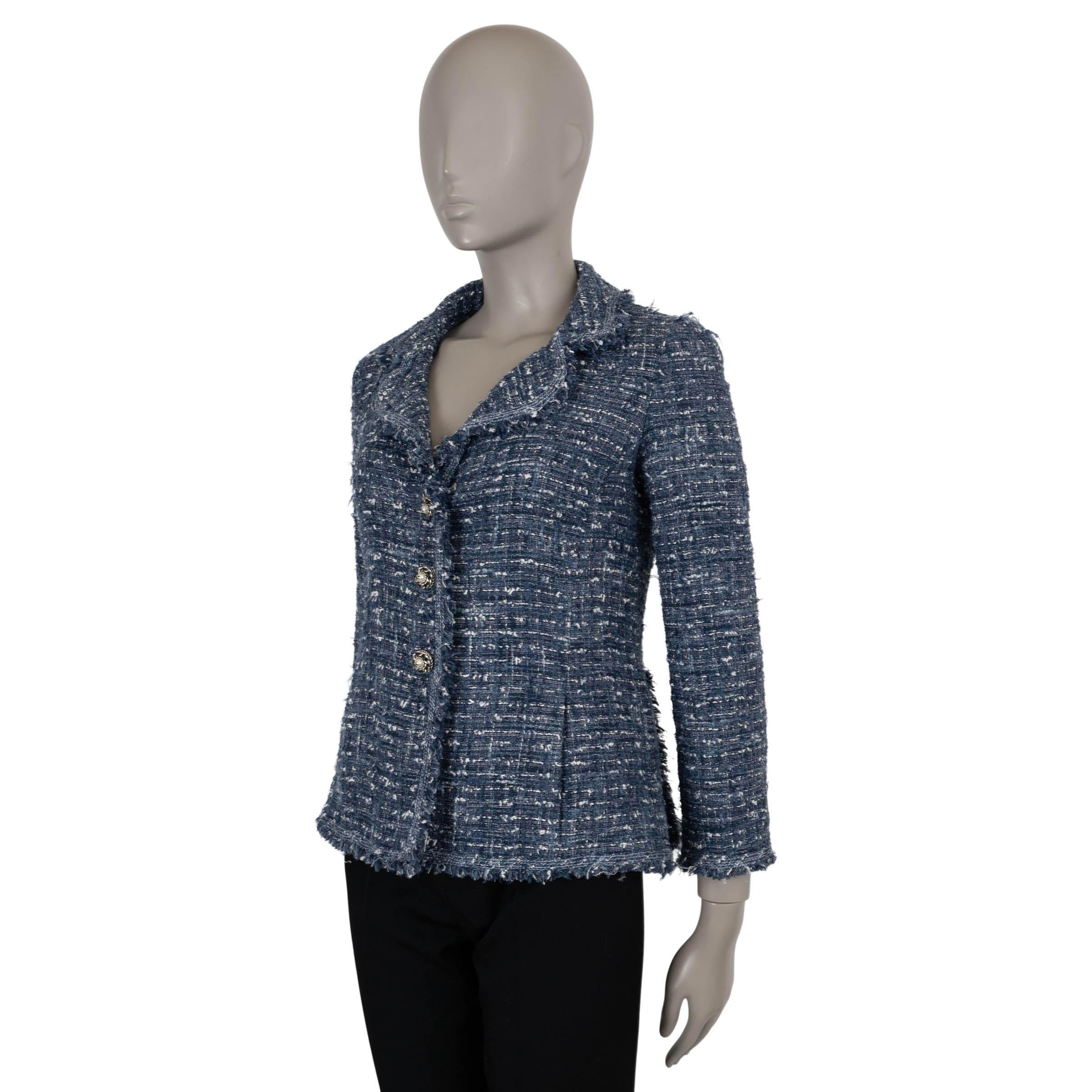 This 100% authentic Chanel jacket is crafted in a blue, black, and white tweed blend (52% polyester, 34% nylon, 9% viscose, 3% wool, 2%). It features a fitted silhouette with classic notched lapels and delicate fringe trims for a refined yet