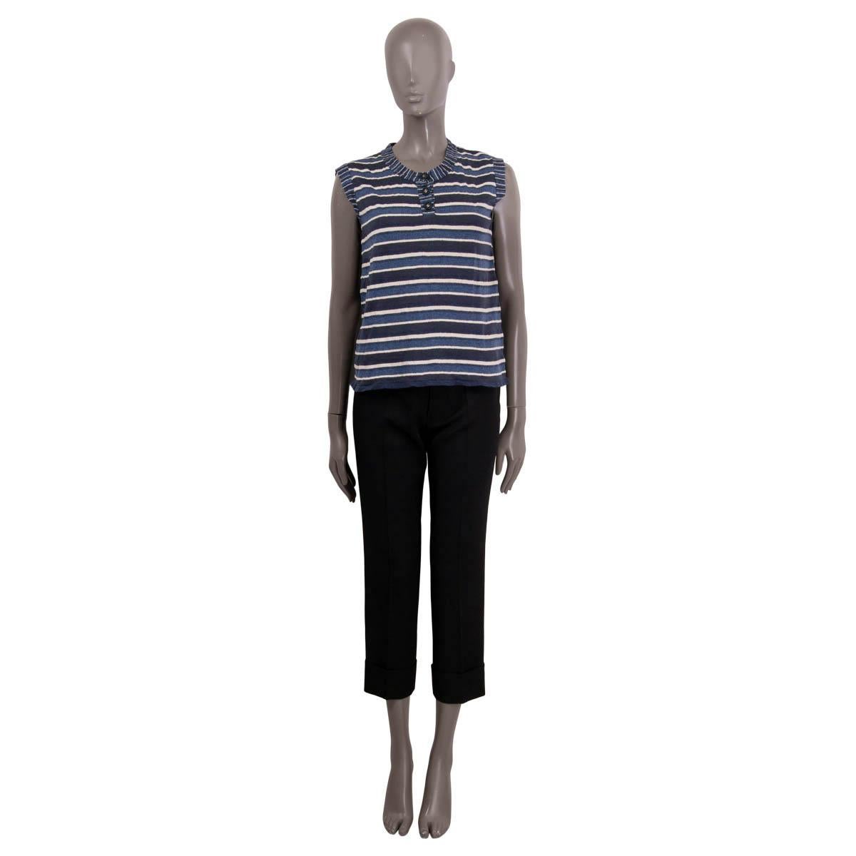 100% authentic Chanel 2007 sleeveless striped t-shirt in blue, navy and off-white cotton (50%), silk (44%) and nylon (6%). The design has three CC embellished denim buttons. Has been worn and is in excellent condition.