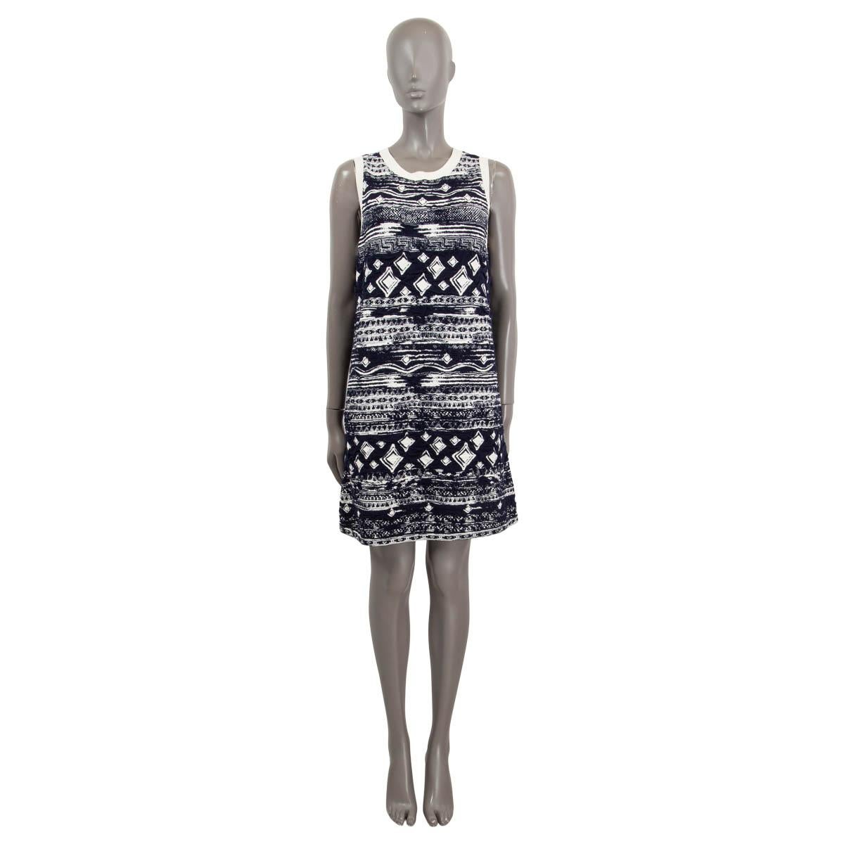 100% authentic Chanel sleeveless mini knit dress in navy blue and ivory cotton (50%), viscose (40%) and polyester (10%). Unlined. Has been worn and is in excellent condition.

2018 Paris-Greece Cruise

Measurements
Model	Chanel18C
Tag