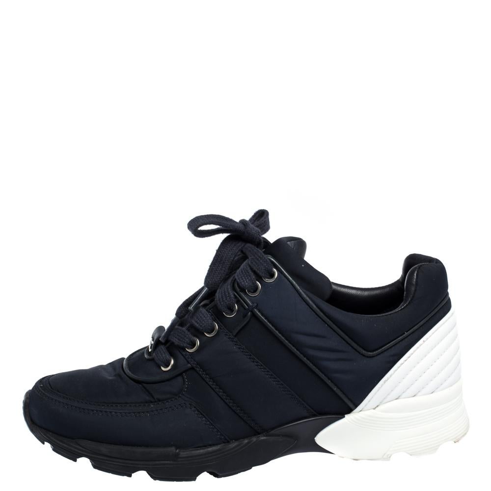 These sneakers from Chanel are amazingly stylish! The exterior of the sneakers flaunts a mix of materials and hues while featuring a sturdy silhouette and CC logo on the front. They come equipped with comfortable leather-lined insoles, laced vamps