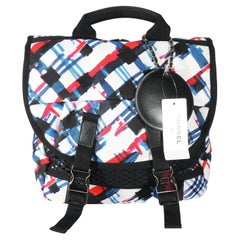 Sac à dos d'avion Chanel en nylon bleu, blanc et rouge