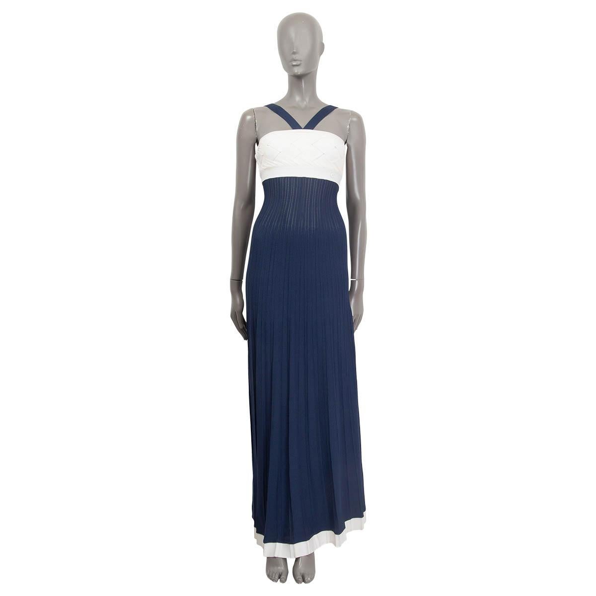 100% authentic Chanel 2008 semi sheer maxi dress in navy blue and off-white rayon (80%), nylon (17%) and spandex (3%). Features a halter neck and a 'CC' emblem on the front. Straps open with two buttons on the back. Has been worn and is in excellent