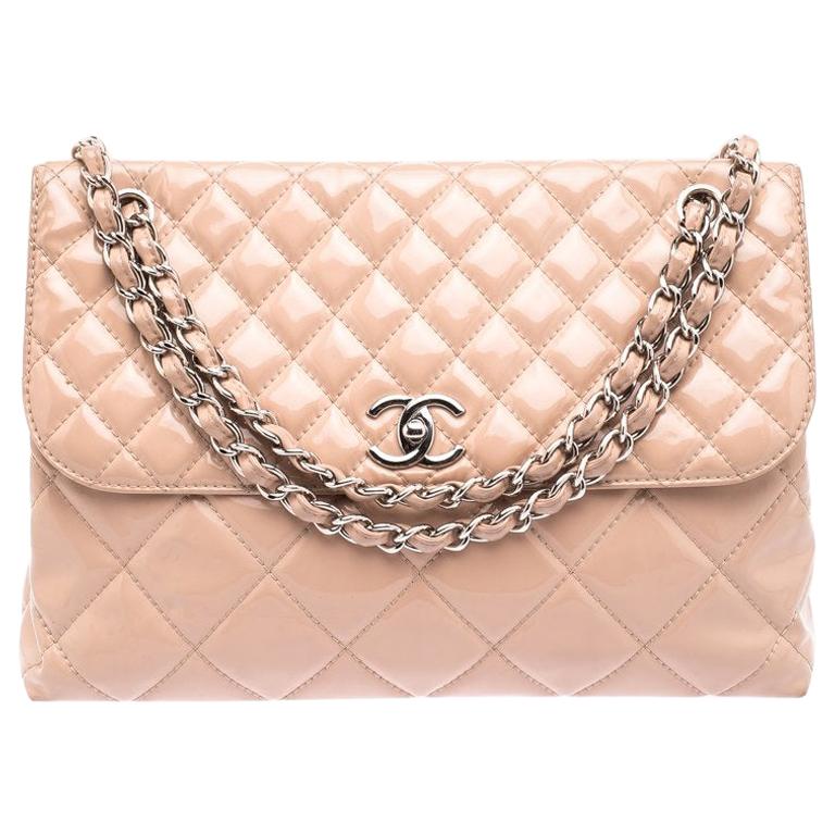 blush patent handbag