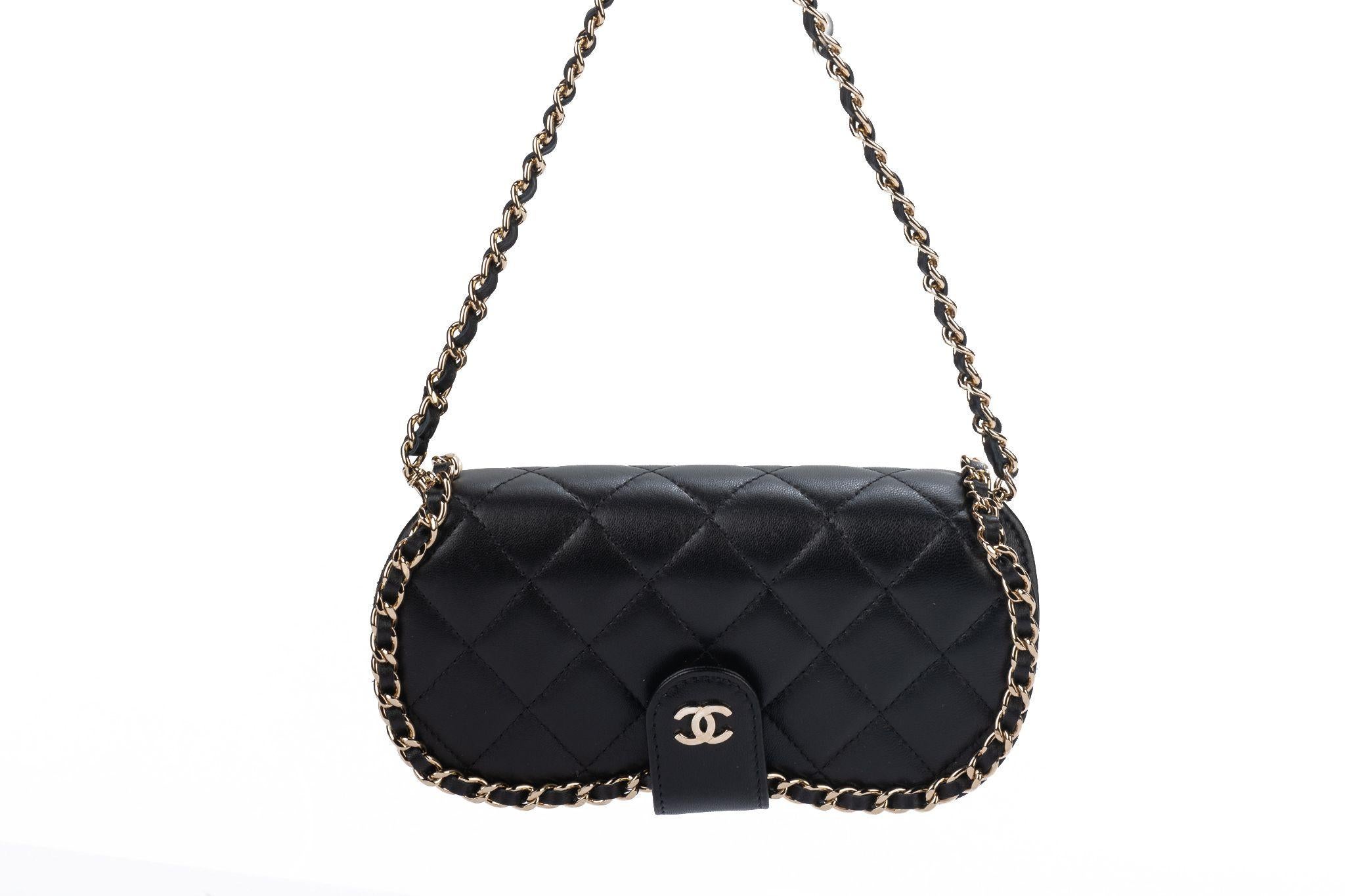 Chanel new rare and collectible black quilted sunglasses case. Can be worn cross body. Chain 22” detachable. Collection 32. Comes with hologram, booklet, dust bag and original box.