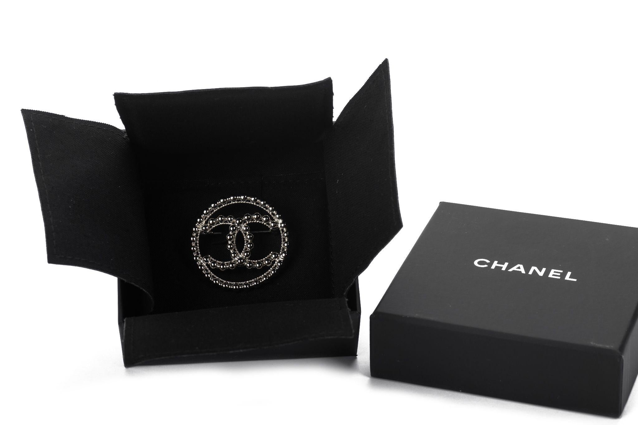 Chanel brand new silver tone round cc logo pin. Collection cruise 2022. Comes with original dust cover , box and ribbon.