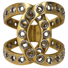 Chanel Bold and Riveting Gold Tone Cuff with Chrome Rivets 2 1/8 In. Wide- 2016