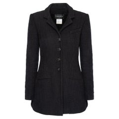CHANEL Parigi / Giacca in tweed nero con bottoni gioiello CC Bombay, taglia 38 FR