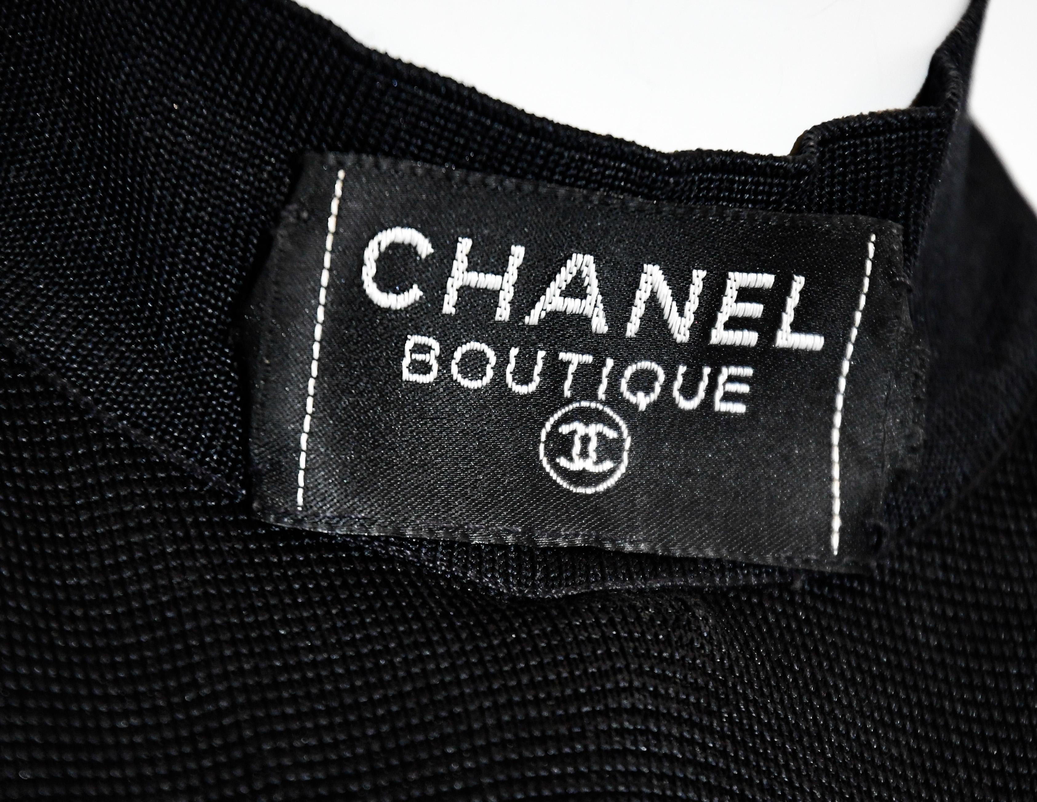Chanel Boutique 1995 Black Knit Halter Dress W/ Bow Decoration at Front & Back  In Excellent Condition For Sale In Palm Beach, FL
