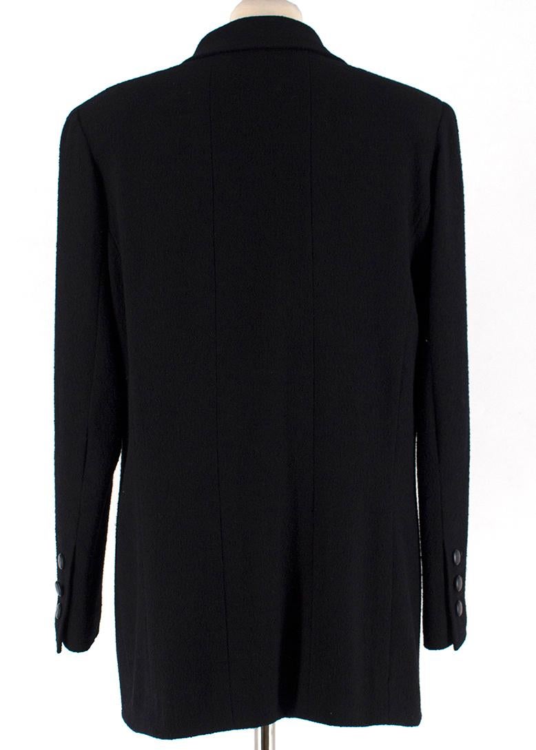 Chanel Black Wool-blend Double Crepe Coat

- Black, double crepe
- Padded shoulders
- Long sleeves
- Single buttoned fastening at front and cuffs
- Logo printed buttons
- Notch lapels
- Four front pockets
- Chain detail on interior hem
- Vented