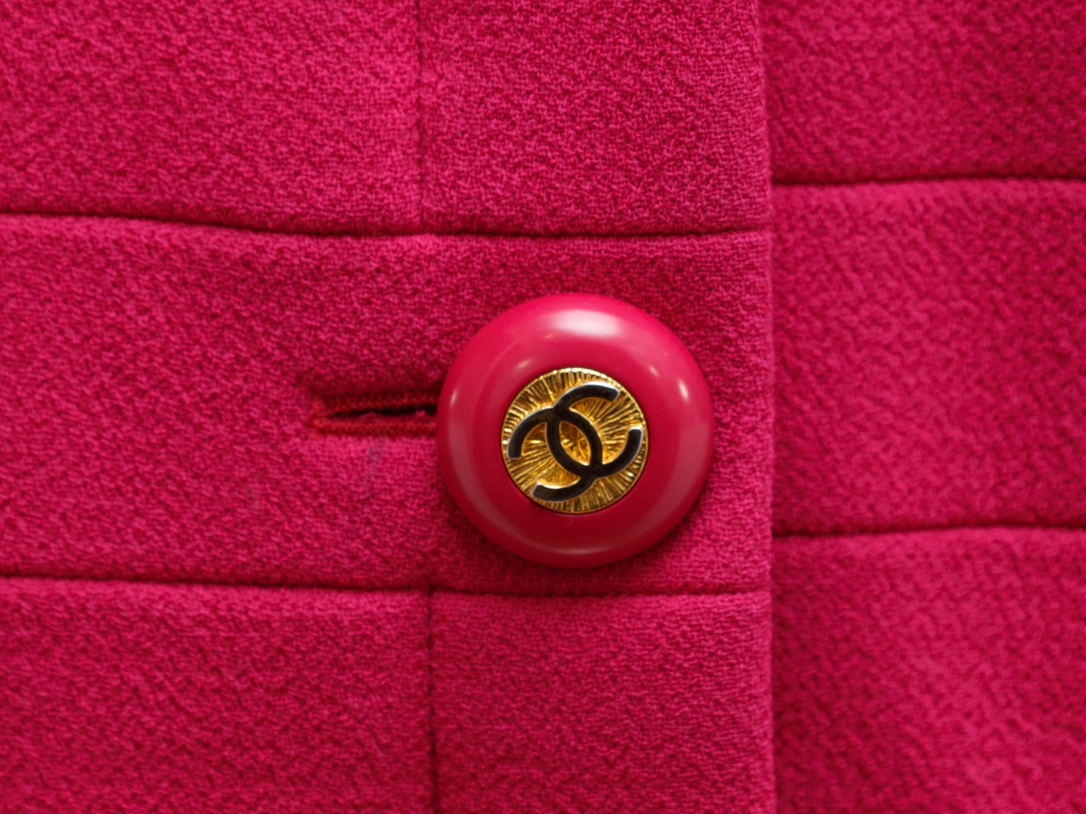 Product details: Vintage bright pink coat by Chanel Boutique. Crew neck. Long sleeves. Dual pockets. Gold-tone CC button closures at center front. Designer size 42. 36