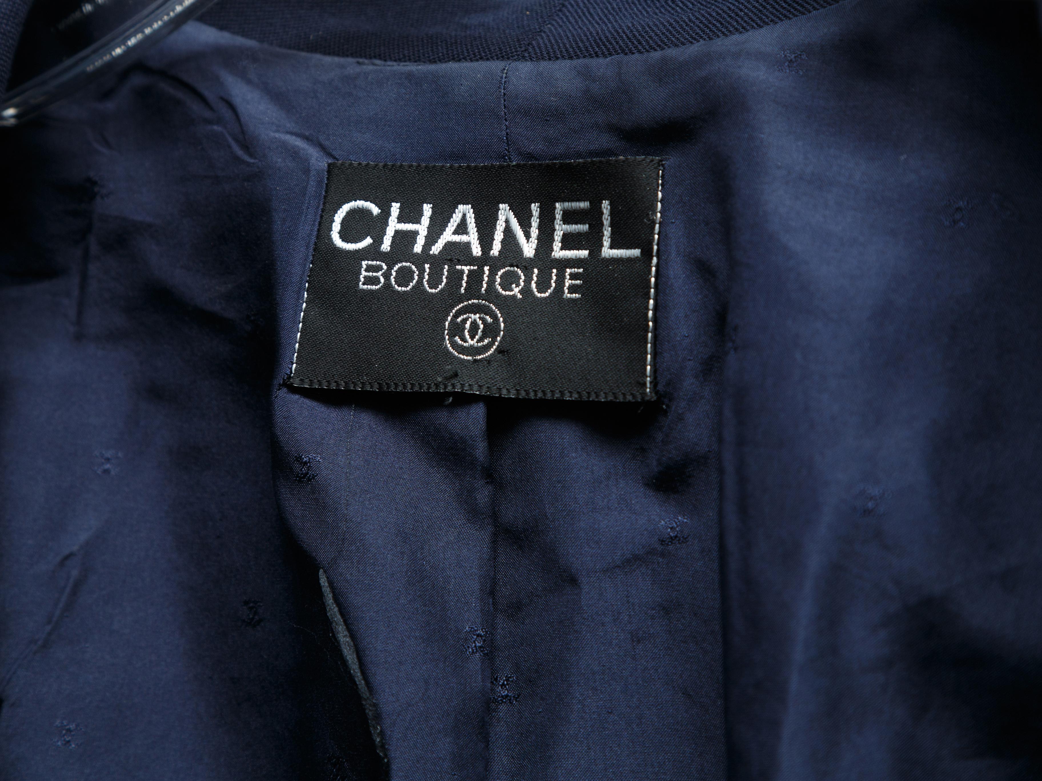 Product details: Vintage navy open front jacket by Chanel Boutique. Notch collar. Three patch pockets. 32