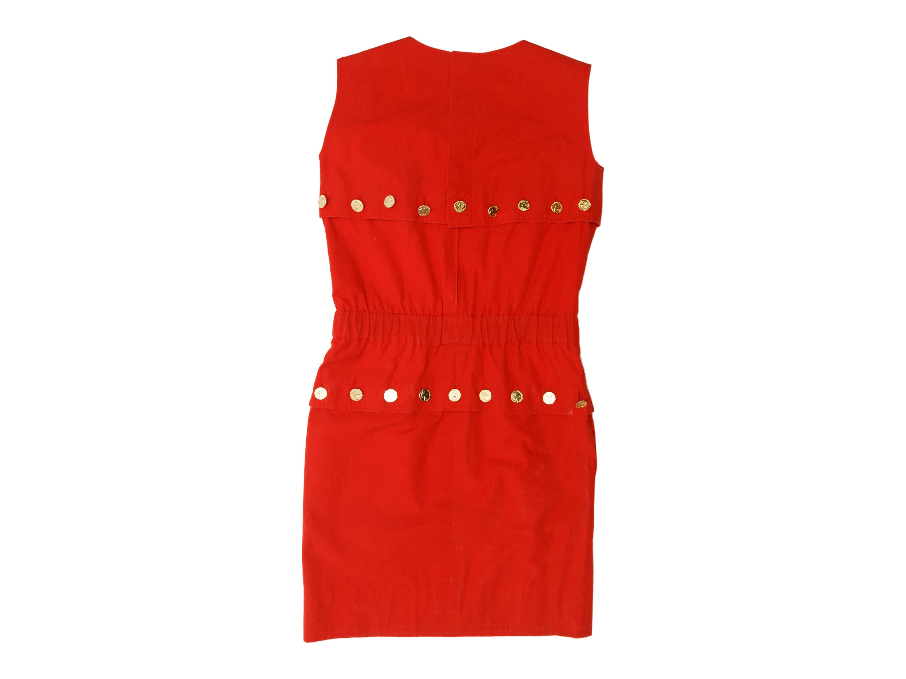 Product details: Vintage red sleeveless dress by Chanel Boutique. Crew neck. Gold-tone button accents throughout. Zip closure at back. 34