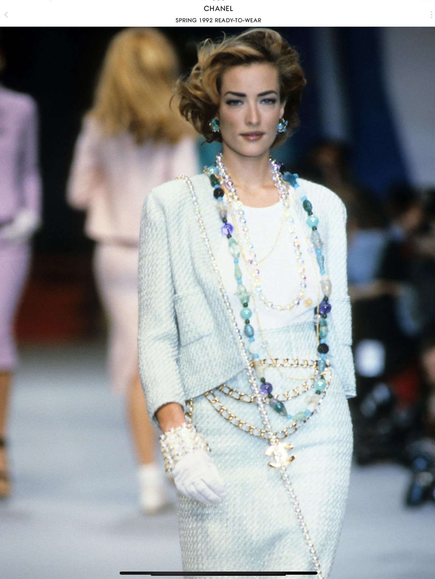 Chanel Boutique Runway Spring 1992 Ivory & Pale Turquoise Wool/Silk Woven Tweed Jacket - Size 44 on the tag however this item was altered and is equivalent more to a size 4 US. This amazing Chanel Runway Jacket was look 5 in the Spring 1992 fashion