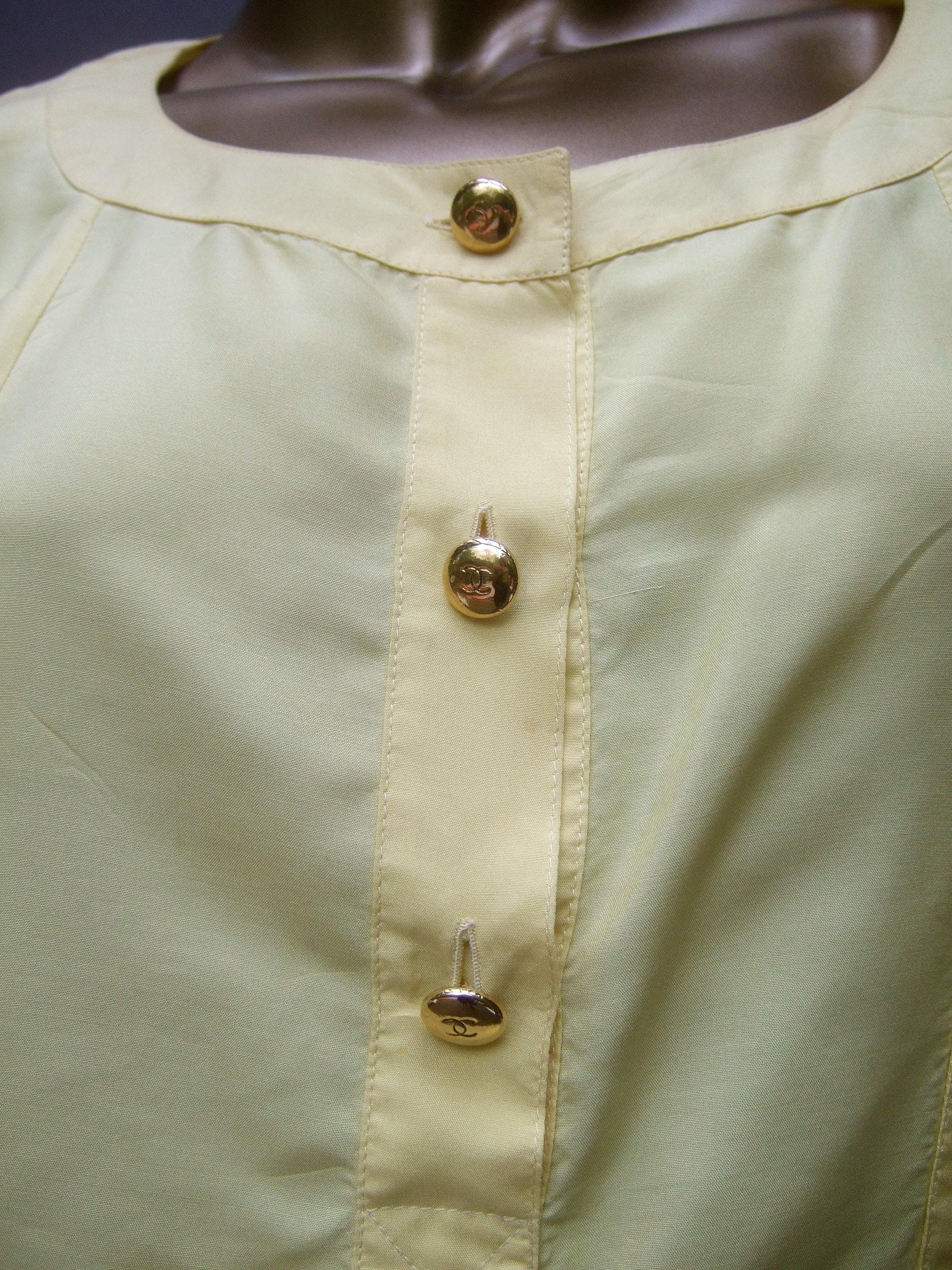 Beige Chanel Boutique Yellow Silk Blouse with Chanel Gilt Buttons c 1980s