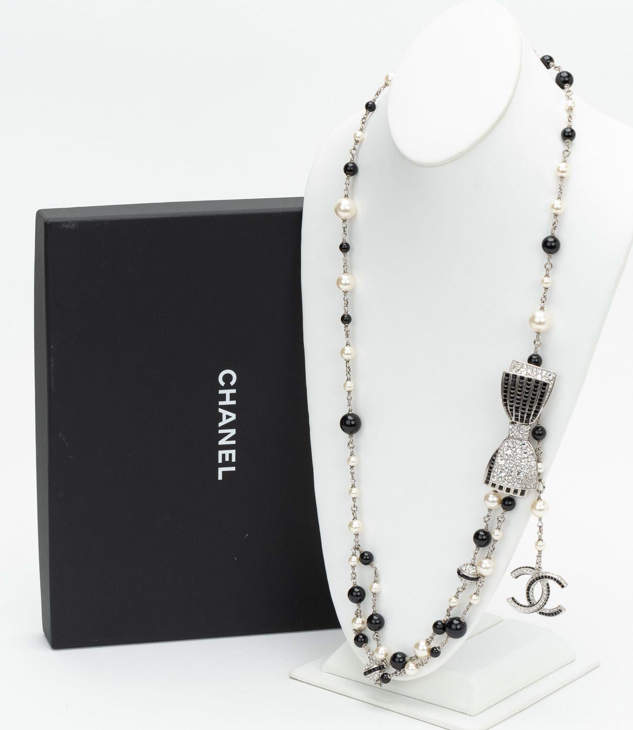 Chanel mint condition long crystal and black necklace with bow detail. Can be worn single or double. Collection spring 2017. Comes with original box.