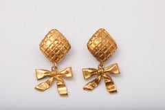 Chanel Bow Dangling Earrings